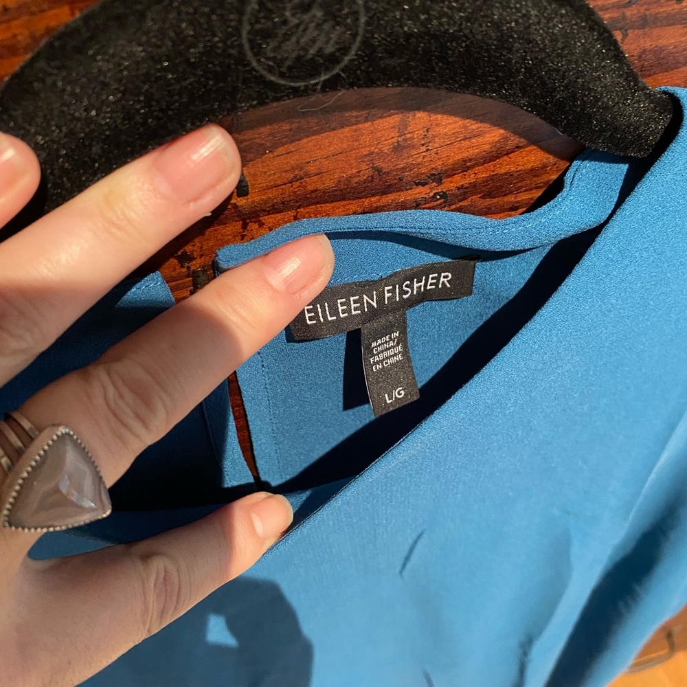 Peacock silk high neck drop sleeve.